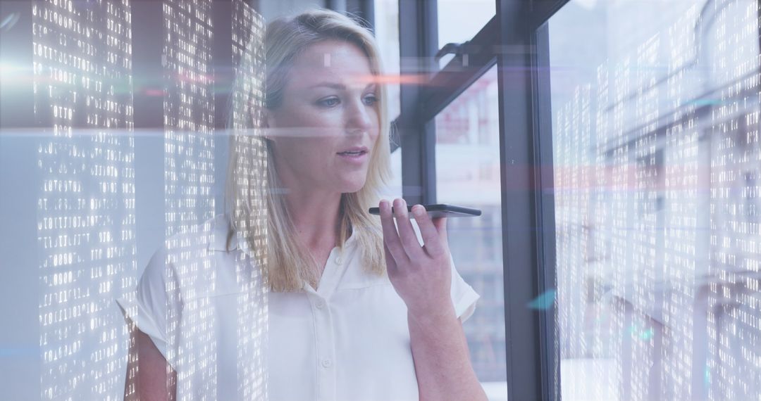 Businesswoman Using Smartphone for Data Communication