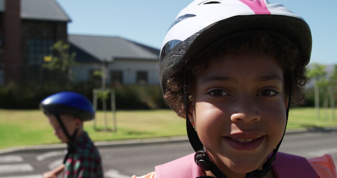 Children Riding Bicycles with Helmets on Sunny Day - Free Images, Stock Photos and Pictures on Pikwizard.com