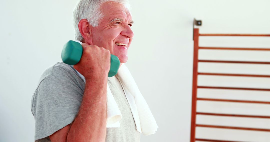 Senior Man Lifting Weights in Home Gym, Staying Fit and Healthy - Free Images, Stock Photos and Pictures on Pikwizard.com