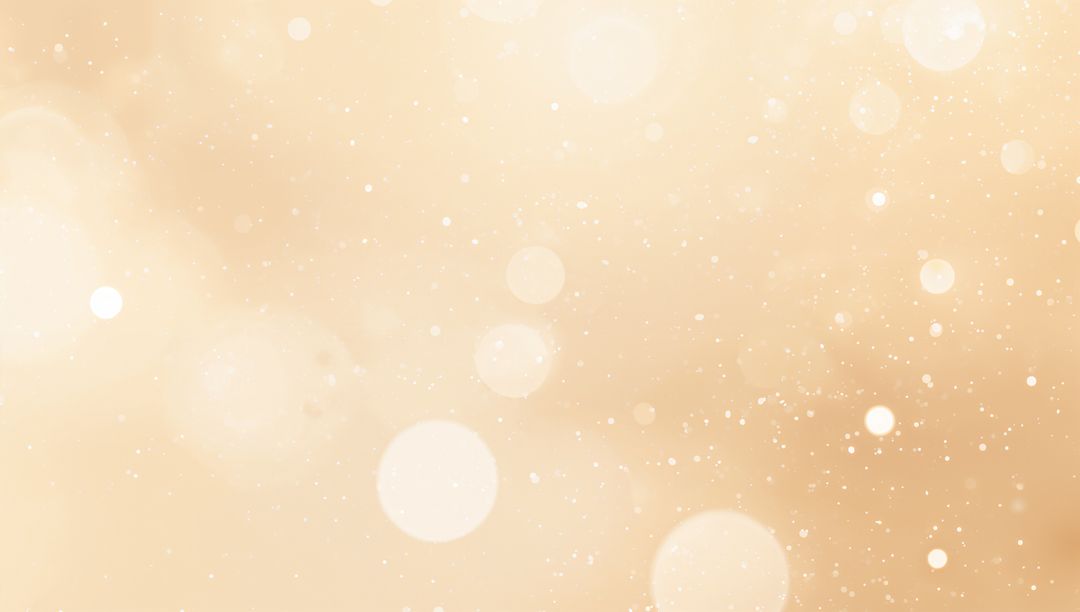 Glowing Soft Beige Bokeh Background Featuring Warm Golden Light and Sparkle