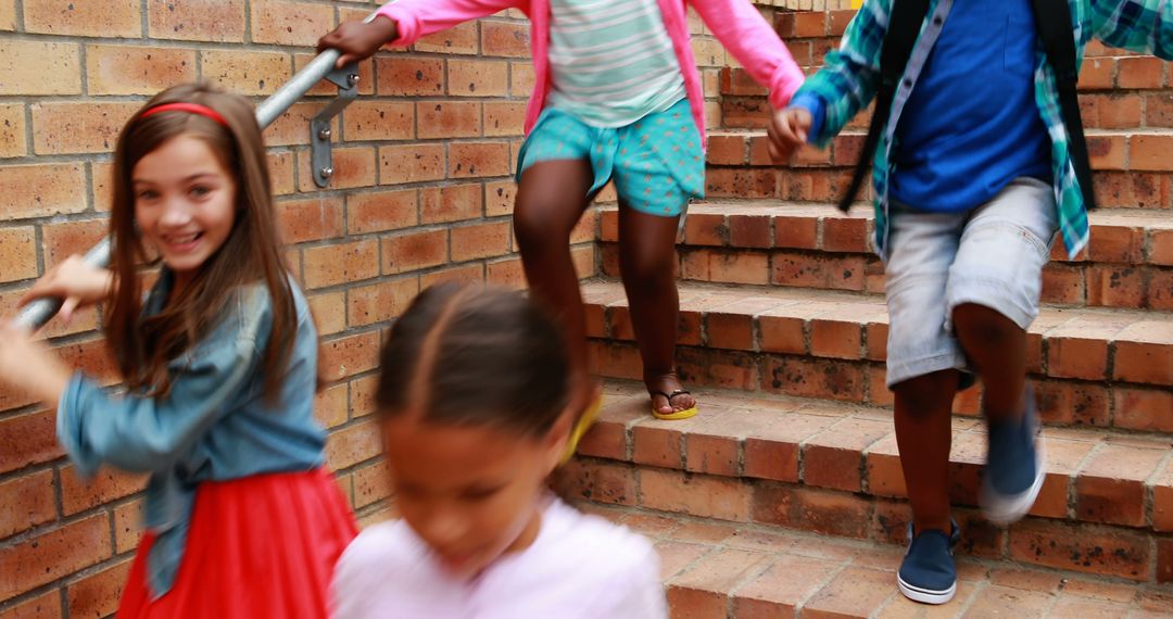 Children Running Down Brick Staircase Outdoors - Free Images, Stock Photos and Pictures on Pikwizard.com