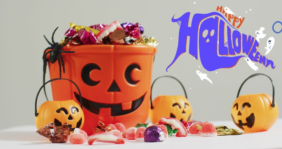 Halloween Candy Bucket with Candy and Ghost Decorations