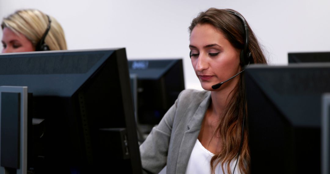 Customer Support Representatives Working in Modern Call Center - Free Images, Stock Photos and Pictures on Pikwizard.com