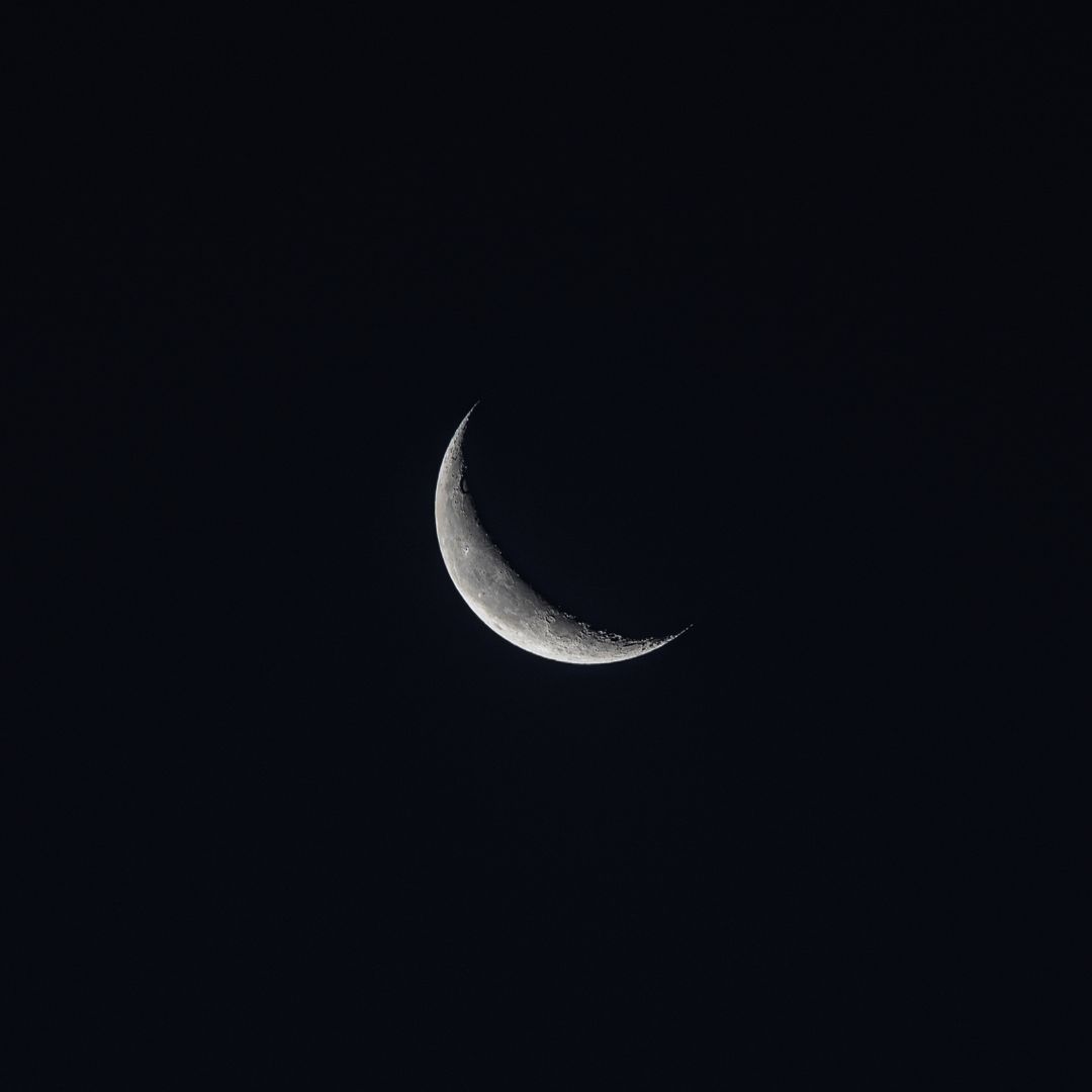 Captivating Crescent Moon Against Midnight Sky