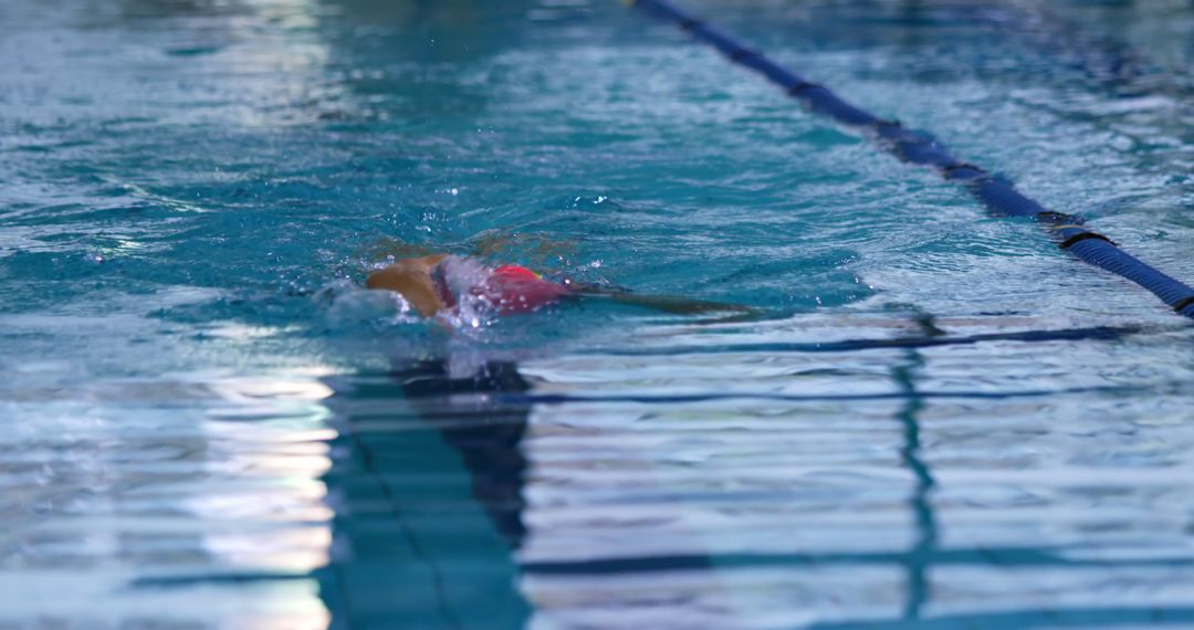 Competitive Swimmer Training in Indoor Pool - Free Images, Stock Photos and Pictures on Pikwizard.com