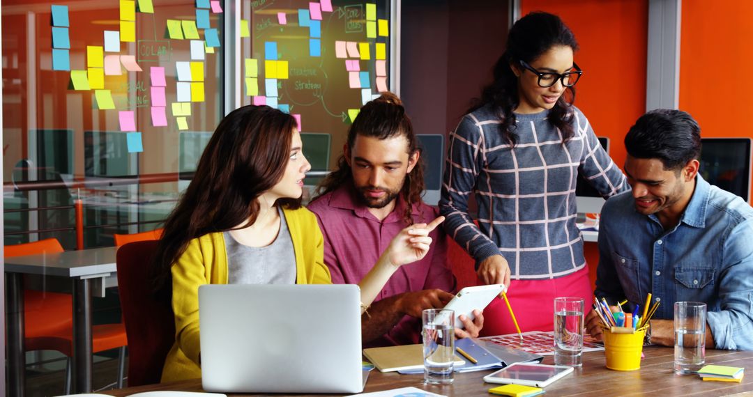 Team Collaboration in Modern Office with Digital Technology