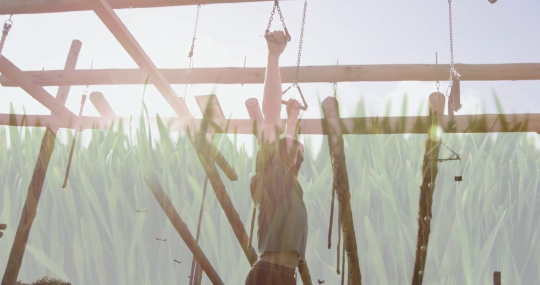 Man Training on Outdoor Obstacle Course with Wooden Structures