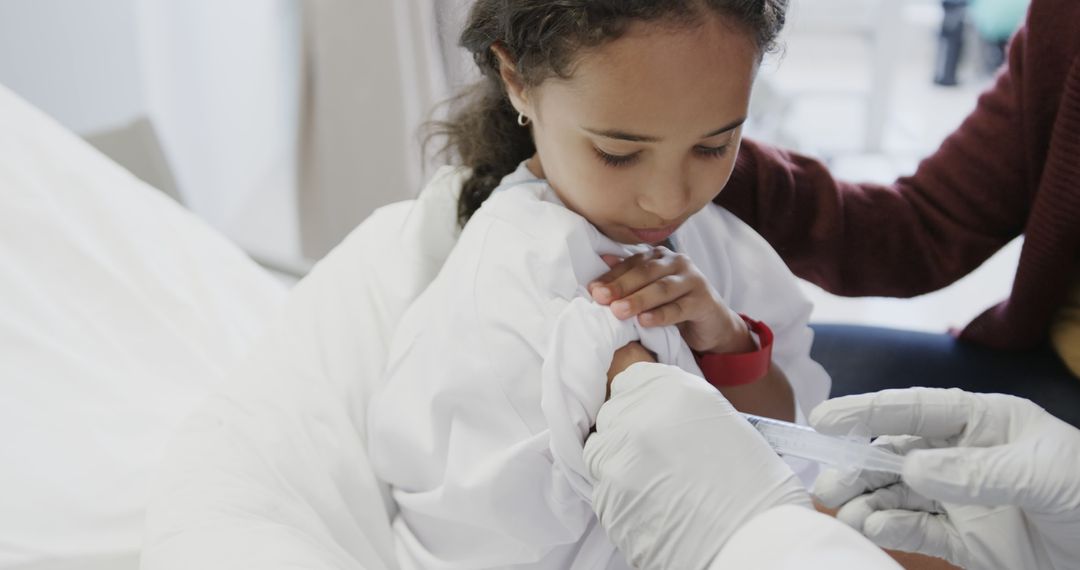 Brave Child Receiving Vaccination in Hospital - Free Images, Stock Photos and Pictures on Pikwizard.com