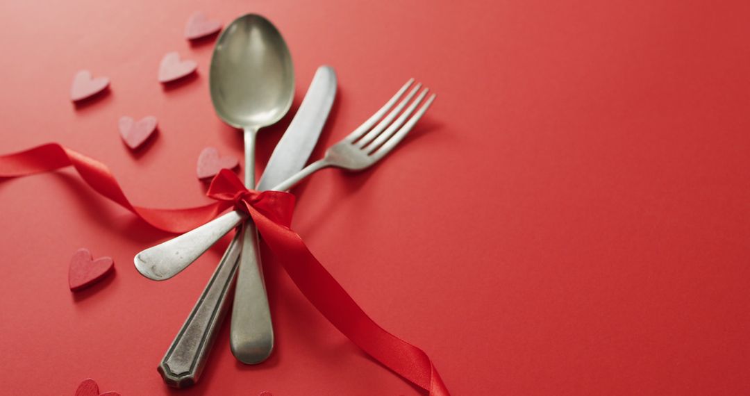 Cutlery Wrapped in Red Ribbon with Hearts on Valentine's Day