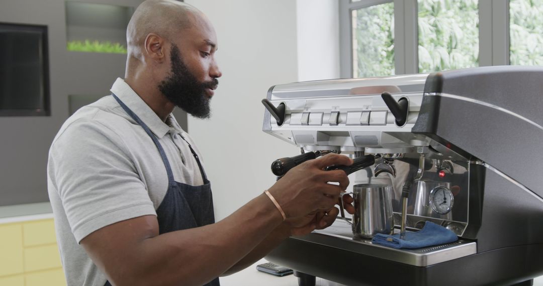 African American Barista Preparing Coffee with Espresso Machine - Free Images, Stock Photos and Pictures on Pikwizard.com