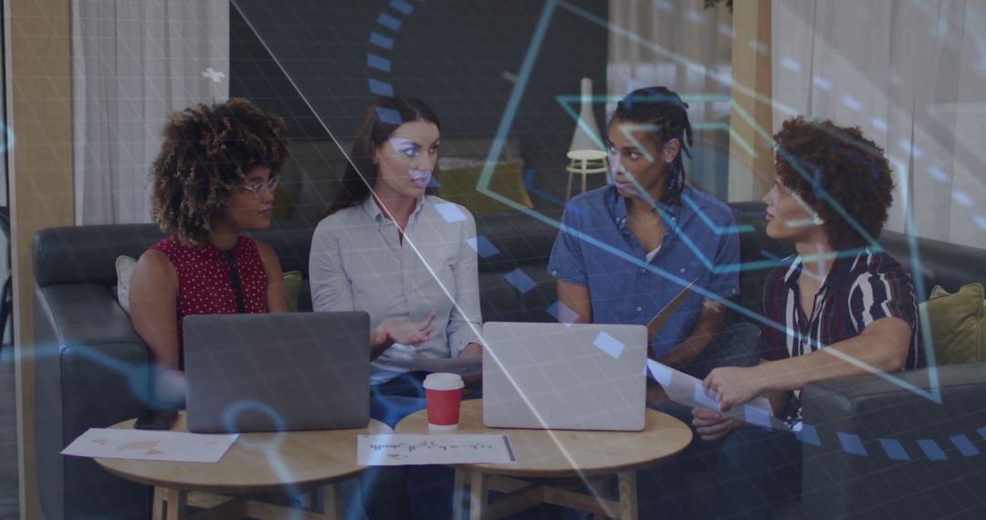 Diverse Team Collaborating in Office Lounge with Technology Overlay