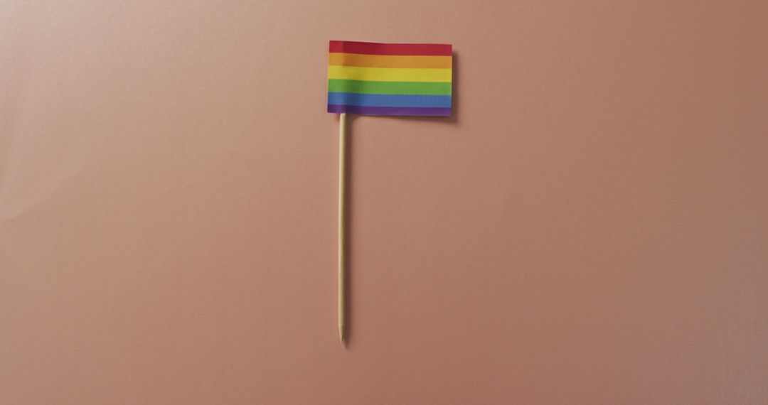 Close up of rainbow flag of pride on gray background - Free Images, Stock Photos and Pictures on Pikwizard.com