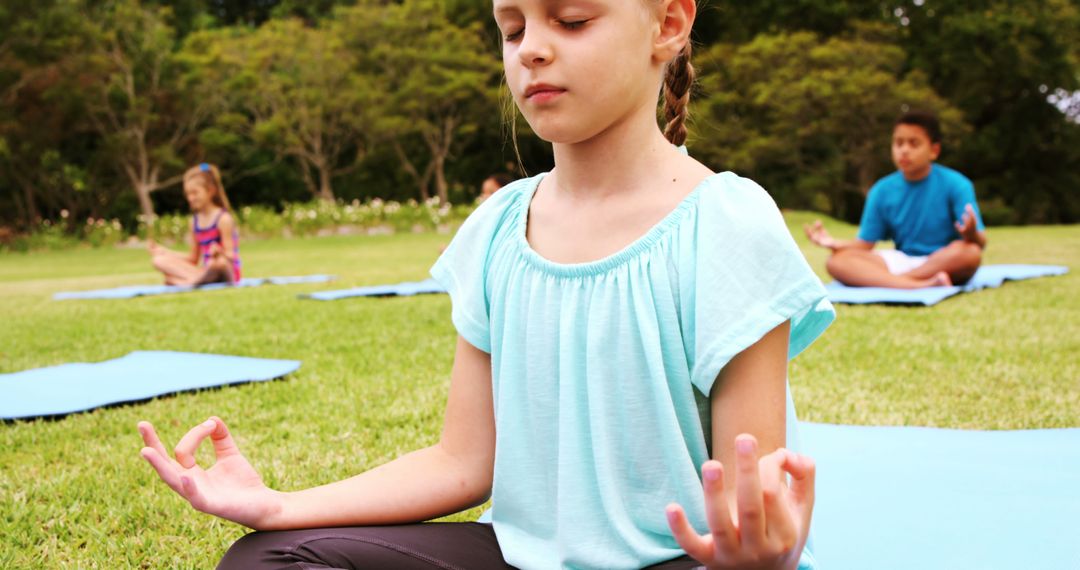 Children Meditating Outdoors in Park - Free Images, Stock Photos and Pictures on Pikwizard.com