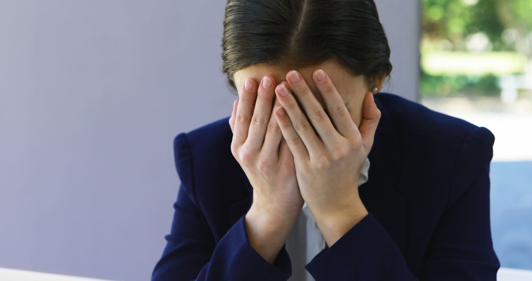 Stressed Businesswoman in Professional Environment - Free Images, Stock Photos and Pictures on Pikwizard.com