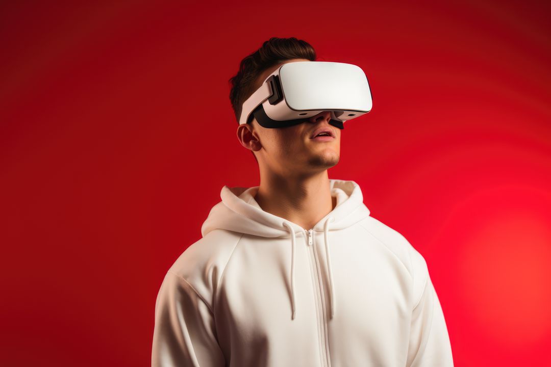 Caucasian man wearing vr and ar headset on red background, created using generative ai technology - Free Images, Stock Photos and Pictures on Pikwizard.com
