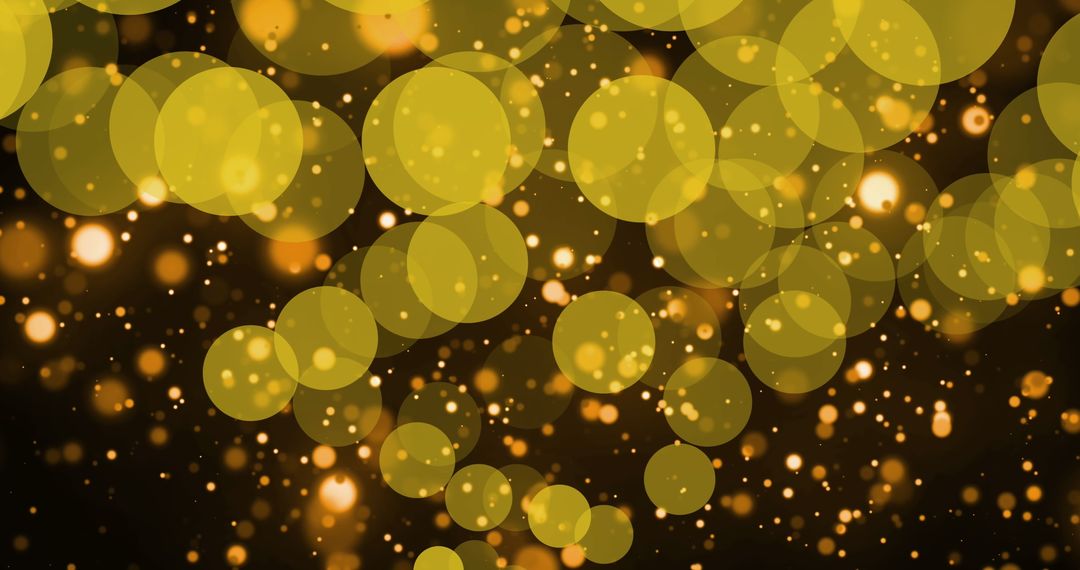 Radiant Golden Bokeh Circles with Glowing Particles on Dark Background