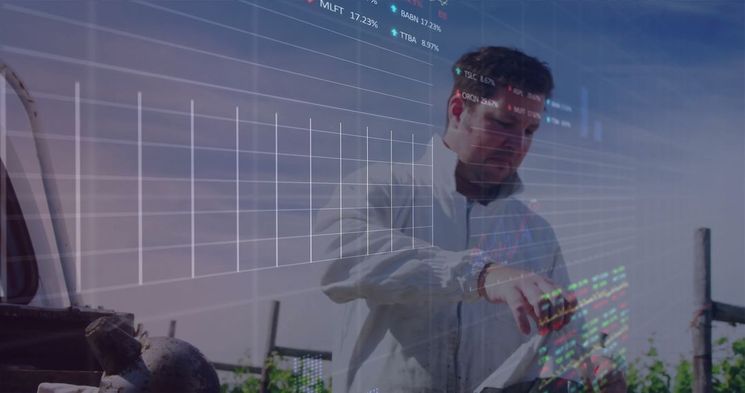 Technician Engaged in Digital Analysis at Industrial Site