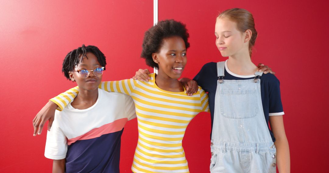 Diverse Group of Friends Gathering in Front of Red Backdrop
