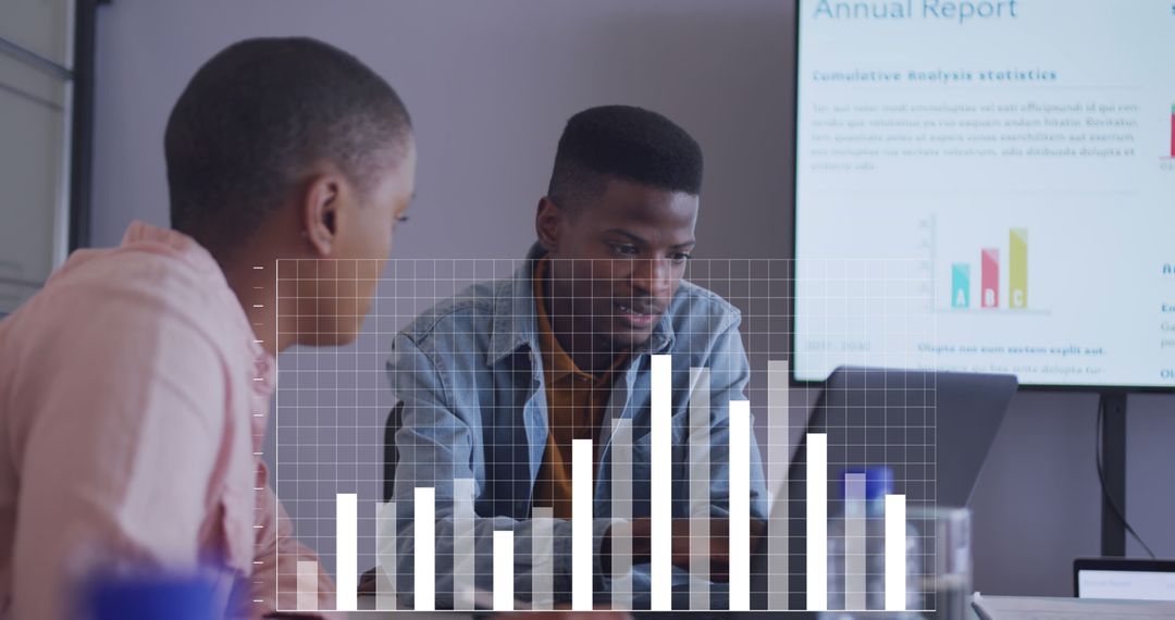 Team Collaborating with Data Analytics in Modern Office Environment