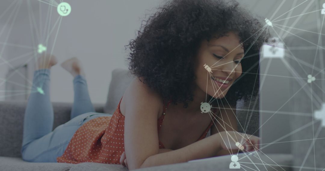 Smiling Woman on Couch with Digital Network Overlay