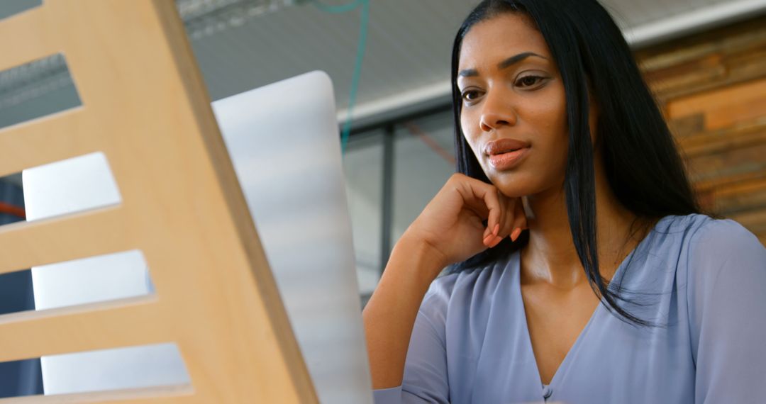 Professional Woman Working on Computer in Office Setup - Free Images, Stock Photos and Pictures on Pikwizard.com