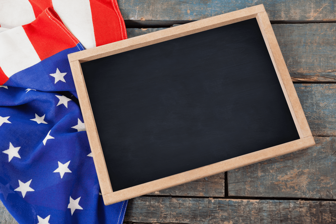 Transparent Chalkboard with American Flag on Rustic Wooden Background