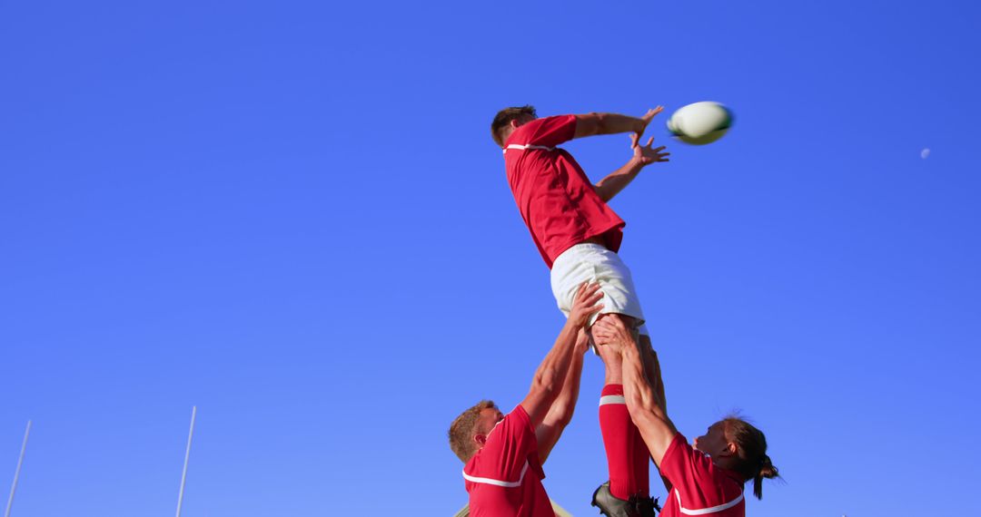 Rugby Players in Action During Lineout on Sunny Day - Free Images, Stock Photos and Pictures on Pikwizard.com