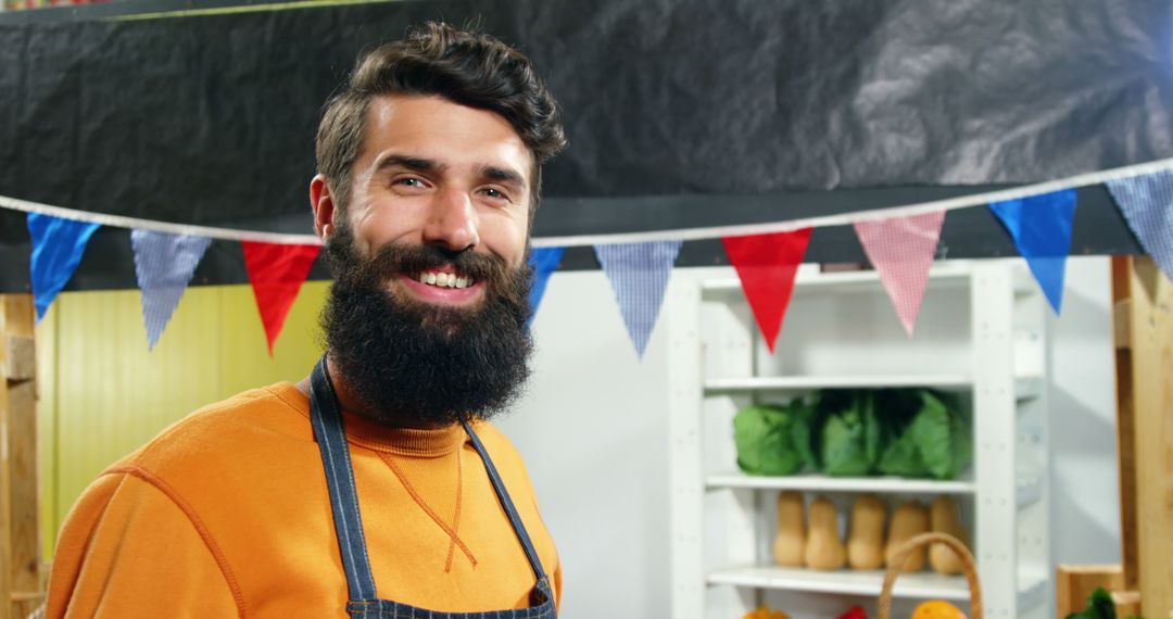 Bearded Young Farmer Smiling at Organic Market Stall - Free Images, Stock Photos and Pictures on Pikwizard.com