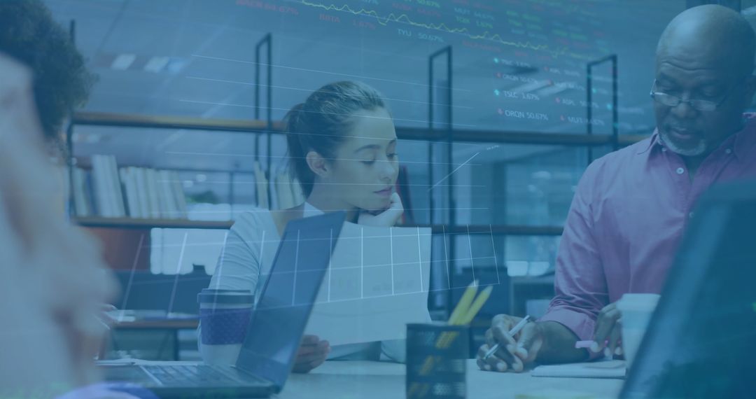 Team Collaborating on Financial Data with Technology Interface Overlay