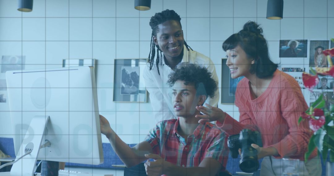 Diverse Creative Team Collaborating on Digital Project