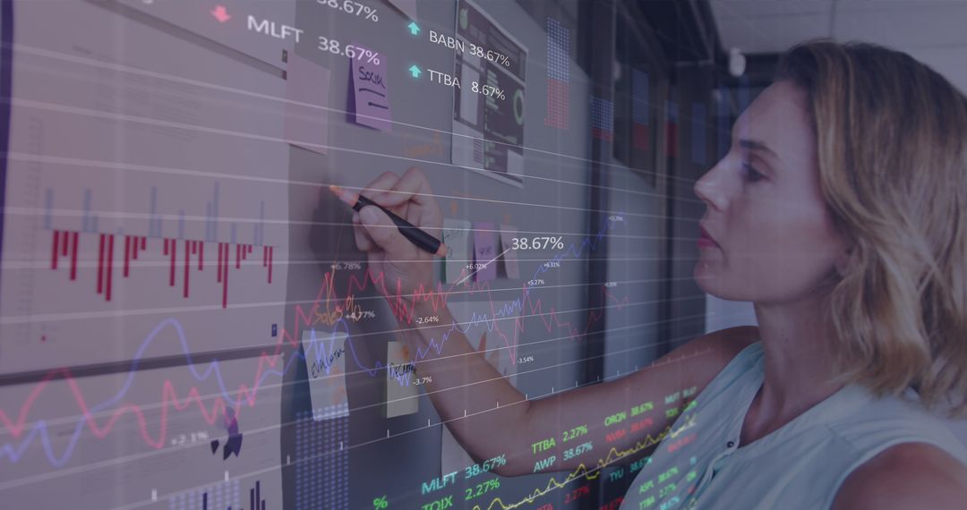Businesswoman Analyzing Statistical Data on Interactive Screen