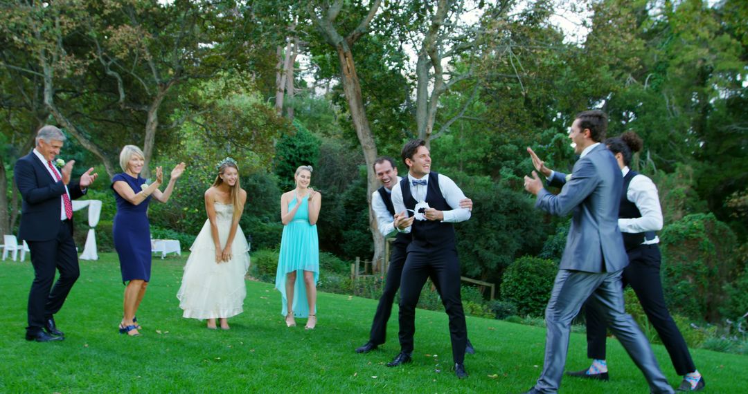 Outdoor Wedding Celebration with Bride, Groom, and Guests Clapping - Free Images, Stock Photos and Pictures on Pikwizard.com