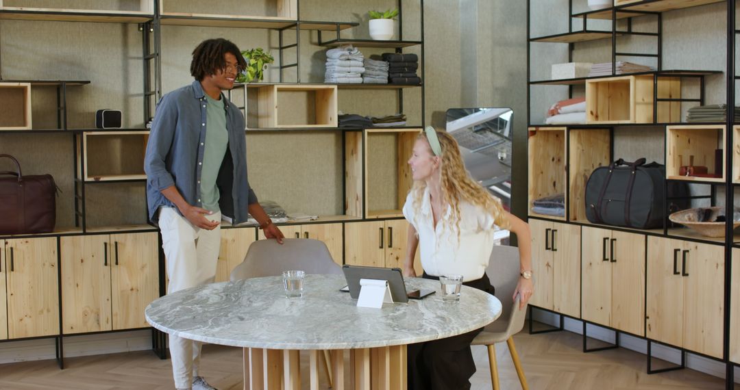 Colleagues Collaborating in Modern Office with Digital Devices