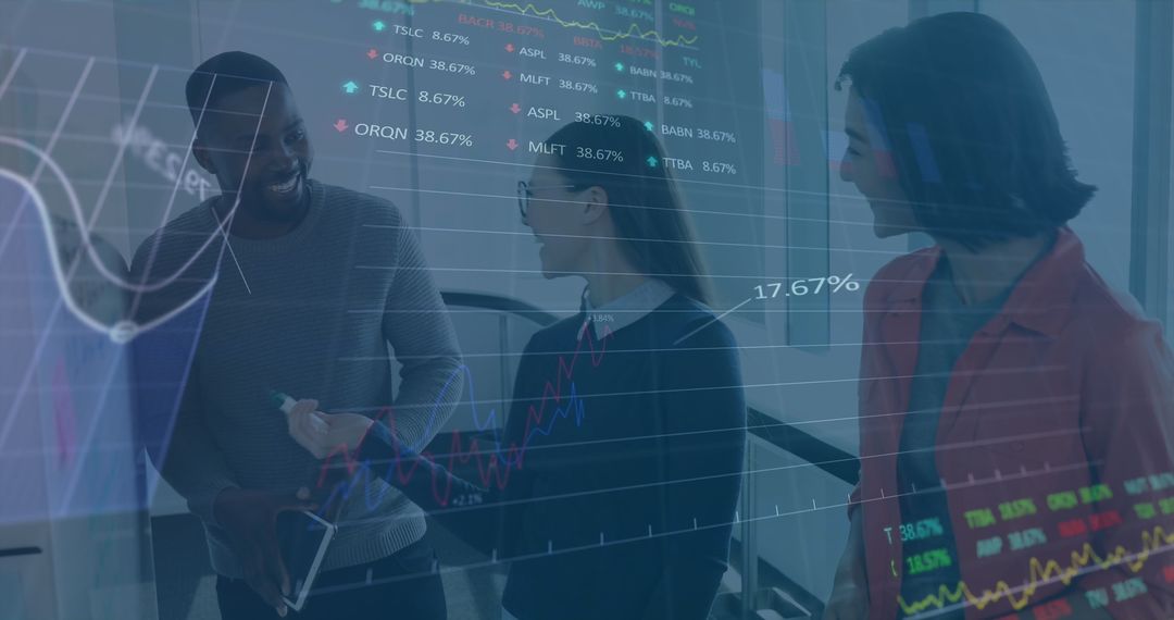 Diverse Team Analyzing Financial Data with Digital Displays