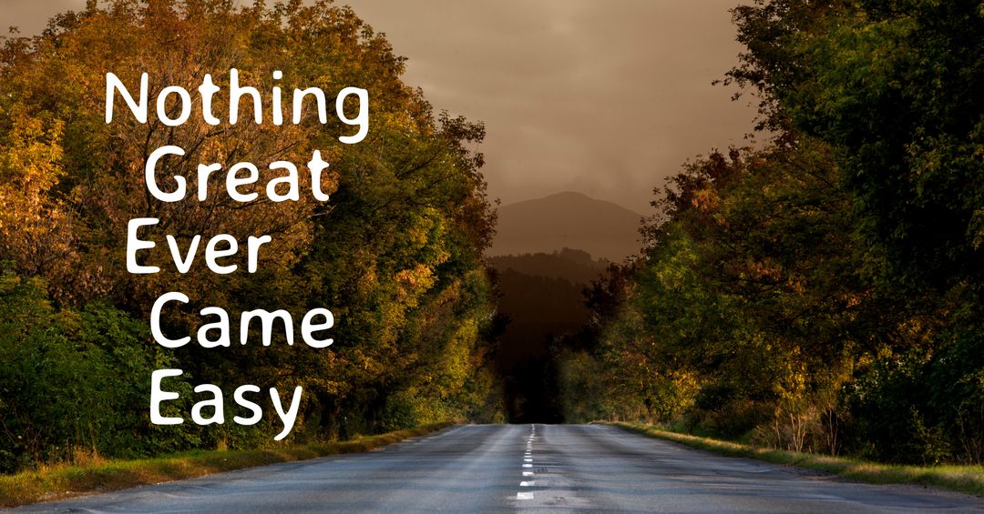 Serene Road Amid Autumn Magnificence with Motivational Message