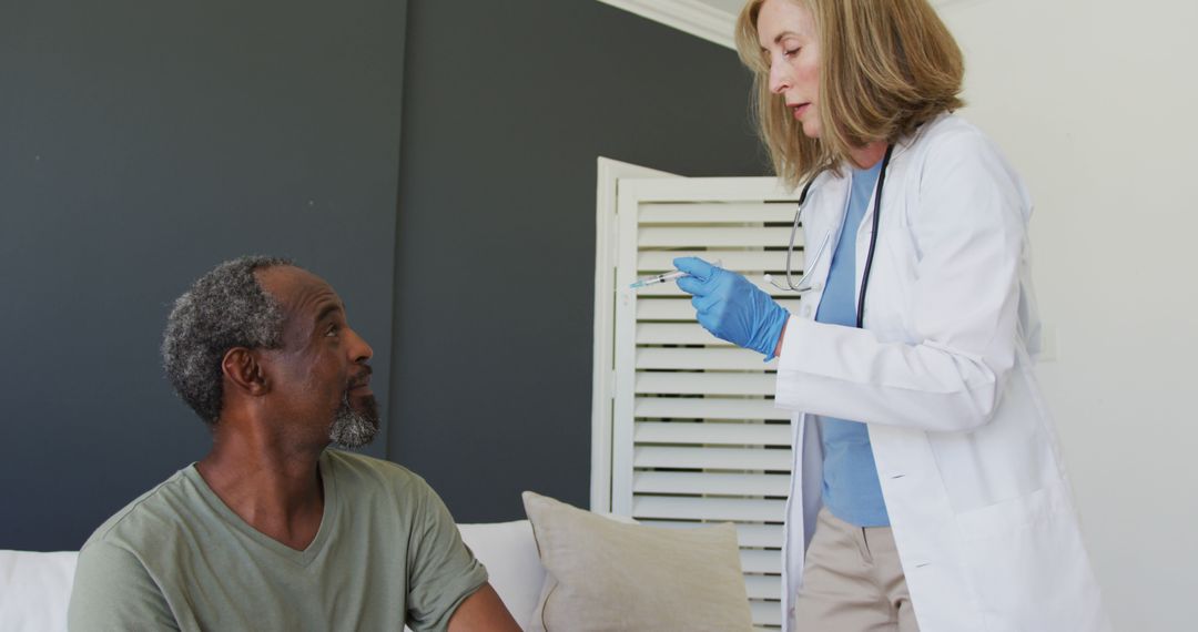 Medical Professional Administering Injection to Elderly Patient at Home - Free Images, Stock Photos and Pictures on Pikwizard.com