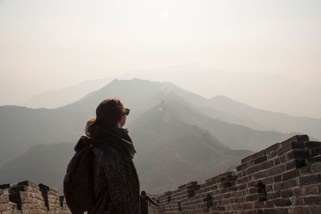 Traveler Enjoying Scenic View of Great Wall of China - Free Images, Stock Photos and Pictures on Pikwizard.com