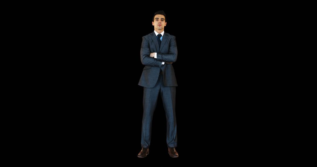 Confident Businessman in Blue Suit with Folded Arms on Black Background - Free Images, Stock Photos and Pictures on Pikwizard.com