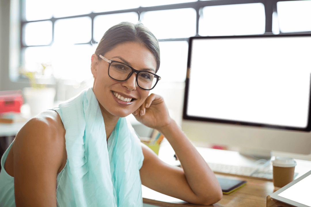 Transparent Office Executive Smiling Confidently at Desk