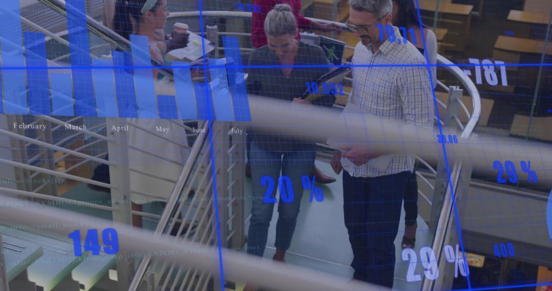 Business Team Collaborating with Data Overlays in Modern Office Environment