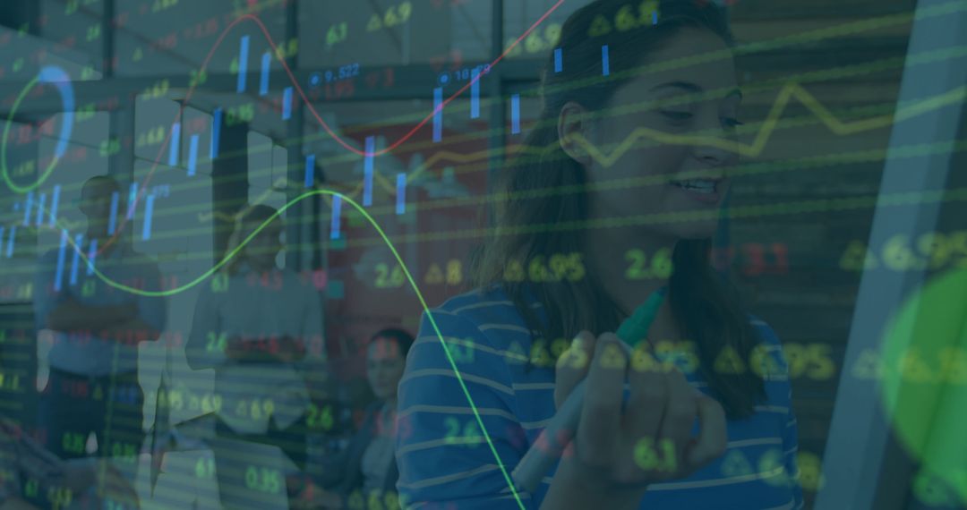 Businesswoman Analyzing Data Trends on Digital Graphics