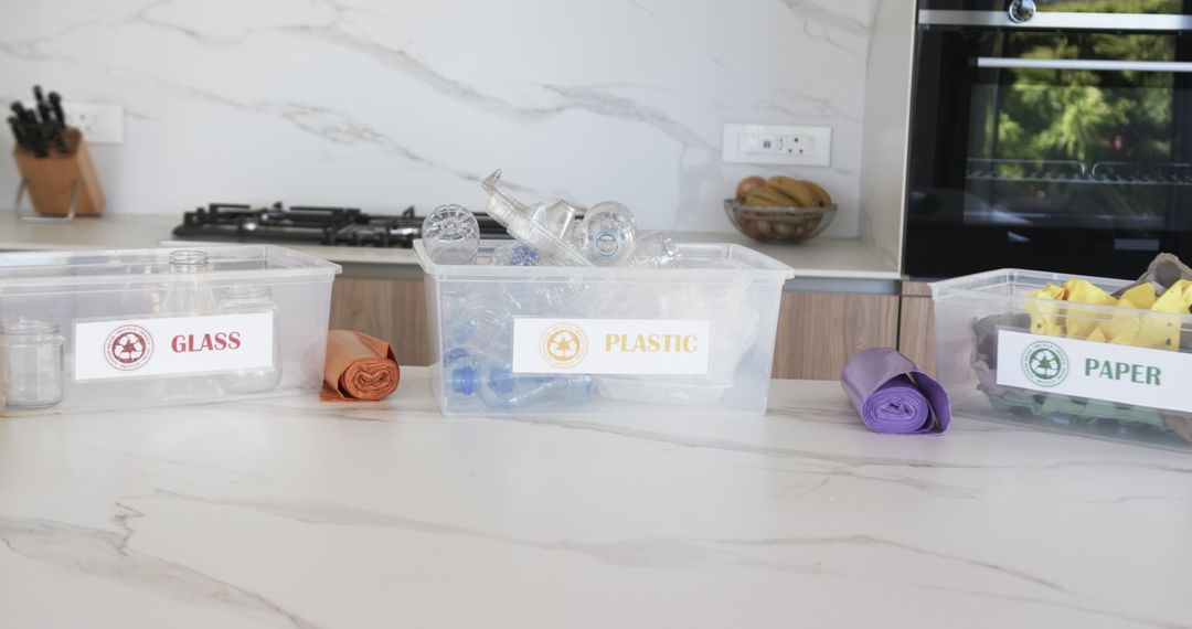 Organized Recycling Bins for Glass, Plastic, Paper in Modern Kitchen
