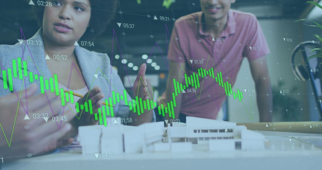 Diverse Analyzing Business Data With Futuristic Chart Overlay in Office - Free Images, Stock Photos and Pictures on Pikwizard.com