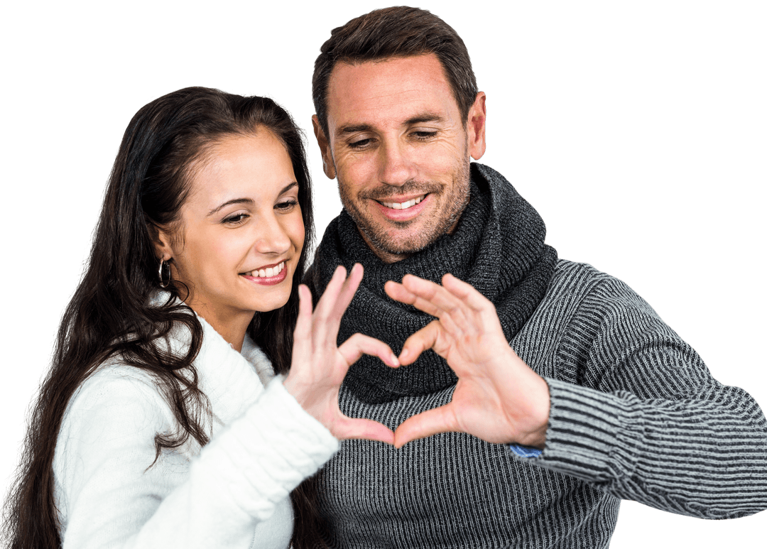 Smiling Couple Making Transparent Heart Frame with Hands