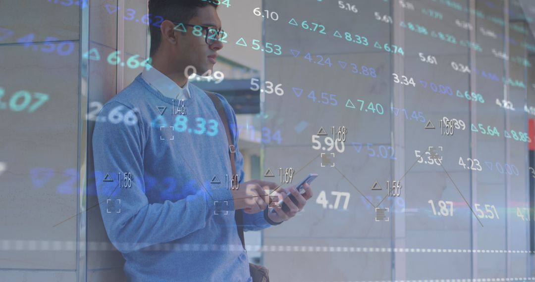 Young Man Analyzing Stock Market Data on Smartphone
