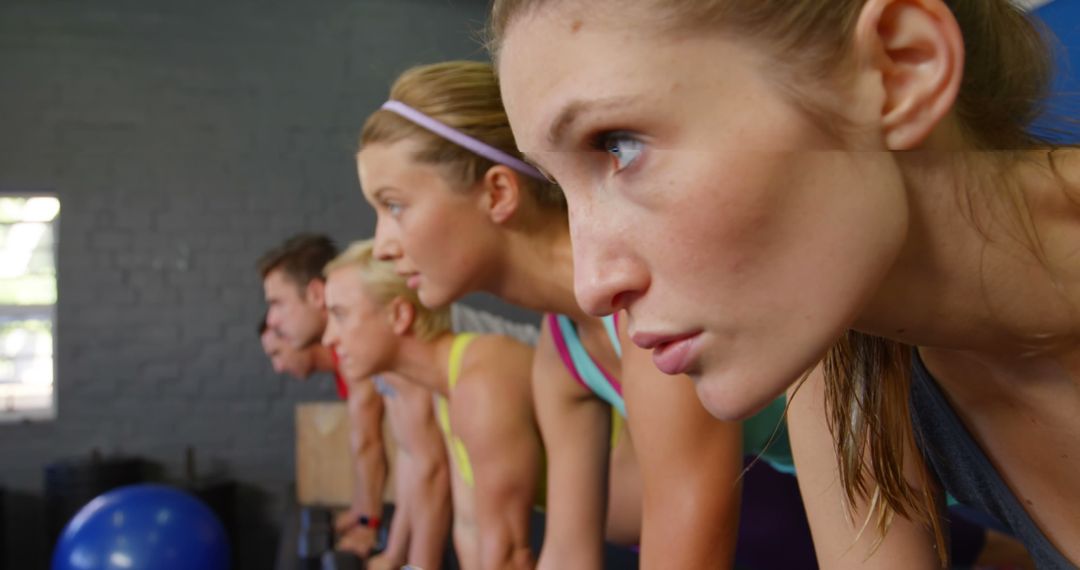 Group of Athletes in Intensive Workout Session - Free Images, Stock Photos and Pictures on Pikwizard.com