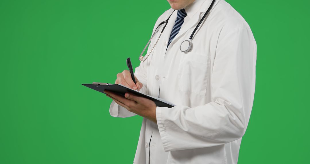 Caucasian doctor reviews medical records, with copy space - Free Images, Stock Photos and Pictures on Pikwizard.com