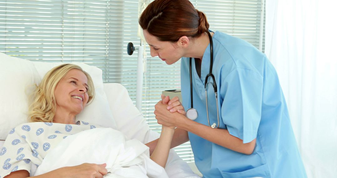 Nurse Comforting Patient in Hospital Bed - Free Images, Stock Photos and Pictures on Pikwizard.com