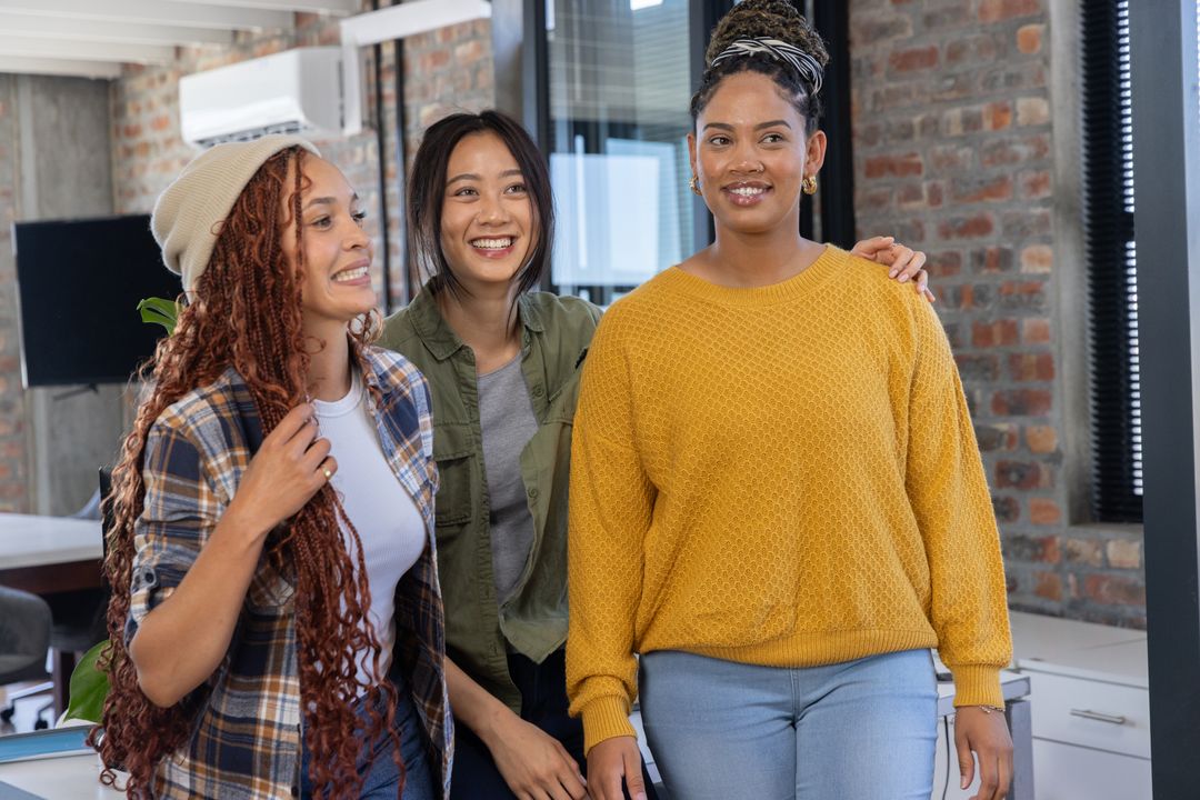 Diverse Female Team Enjoying Collaboration in Modern Office