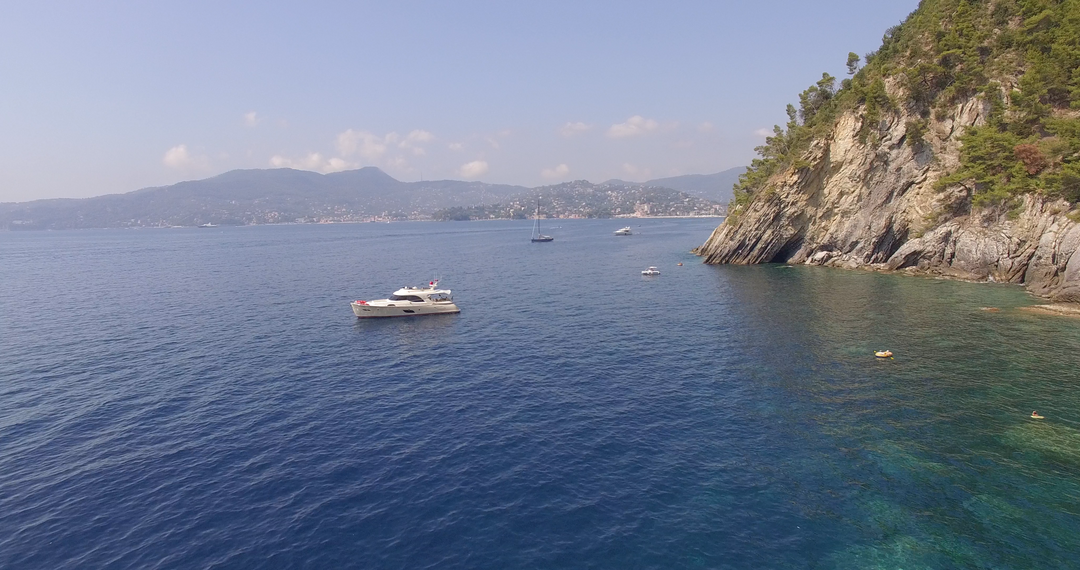 Scenic Transparent Coastal Landscape with Boat - Download Free Stock Images Pikwizard.com